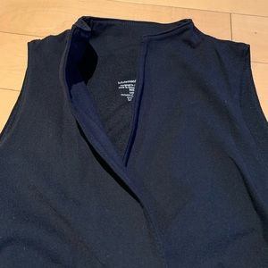 Lululemon top. Women’s size 8. Sleeveless with a plunging neck line. Black.